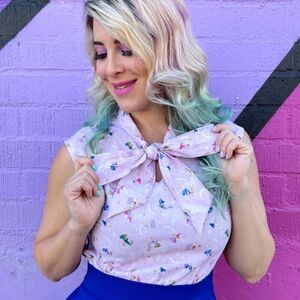 Retrolicious Women’s Pale Pink All Over Fairy Print Bow Sleeveless Tank Blouse